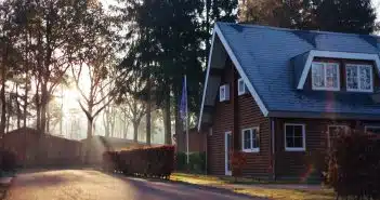 brown and red house near trees