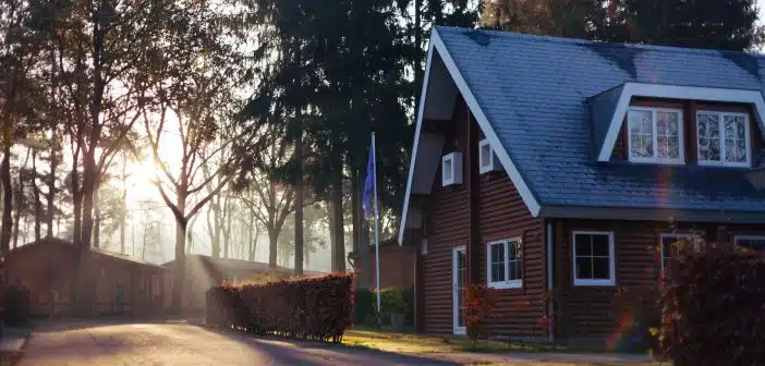 brown and red house near trees